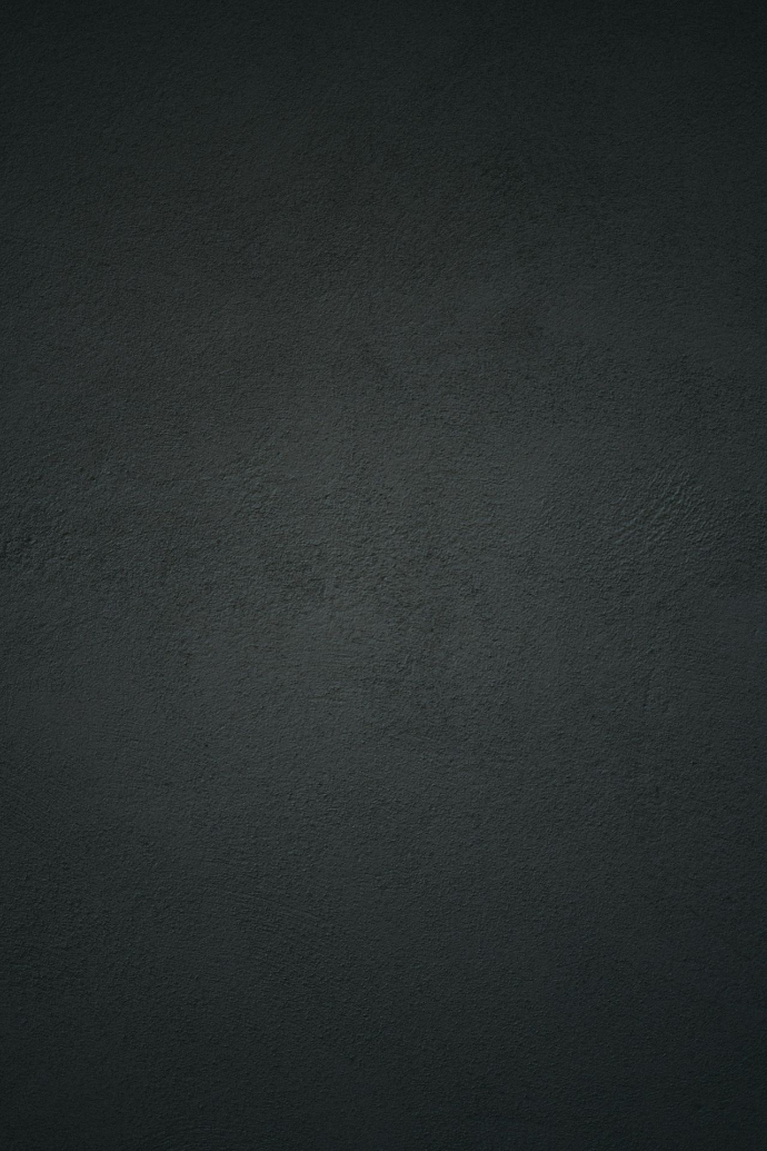 dark textured plaster wall