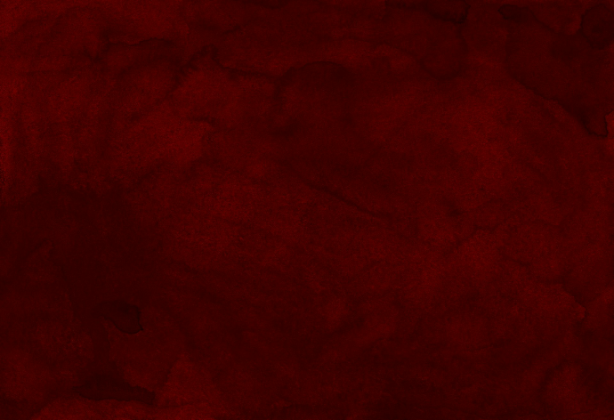 red textile on brown wooden table