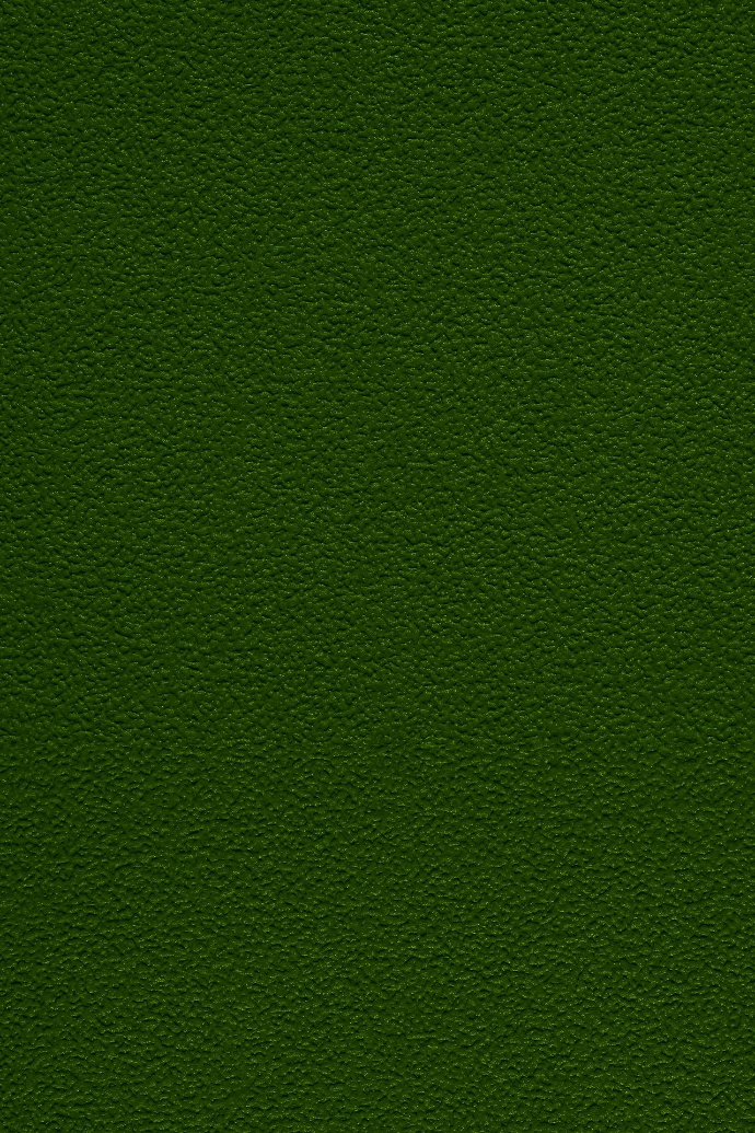 a close up of a green surface with a small patch of grass